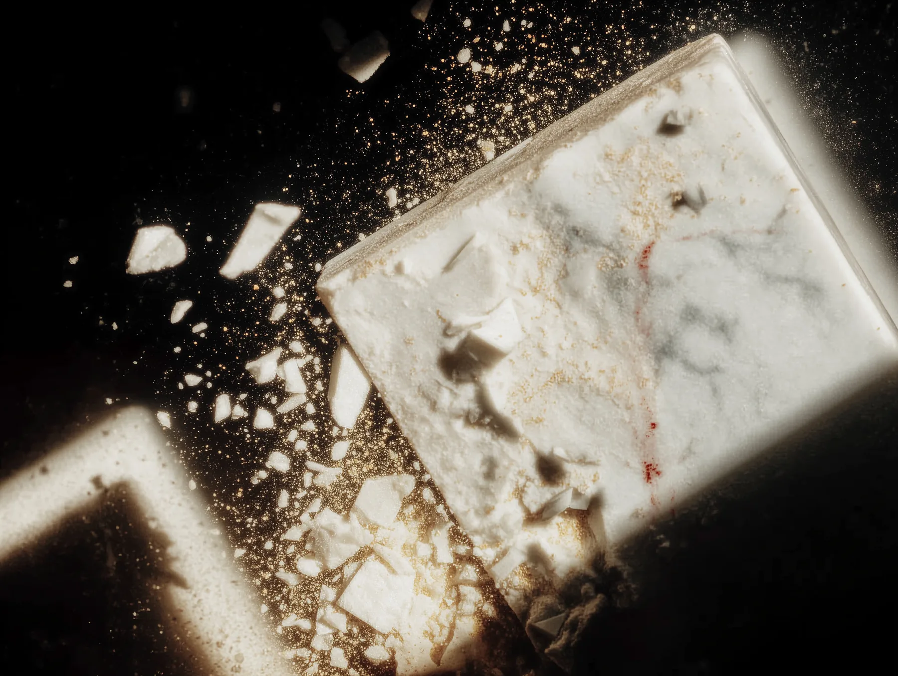Broken marble block and dust representing the raw structure ARCO needed to carve into a clearer system